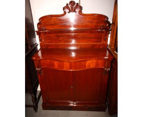 A 19th Century mahogany chiffonier, back fitted shelf, serpentine front base fitted two drawers and cupboards, 39" wide