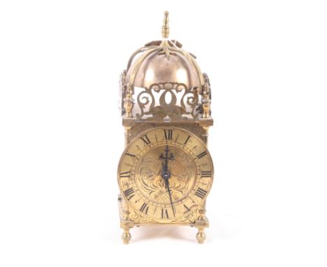 A 17th Century design brass lantern clock, 11" high