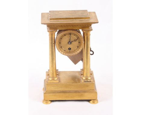 A 19th Century French gilt metal entablature mantel clock with gilt dial, 9" high