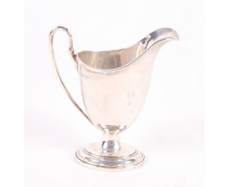 A Georgian design silver helmet cream jug on oval base, 4.5oz troy approx