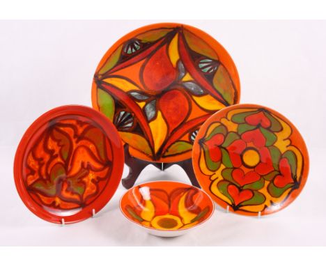 Four Poole Pottery Delphis shallow dishes, largest 10 1/2" dia