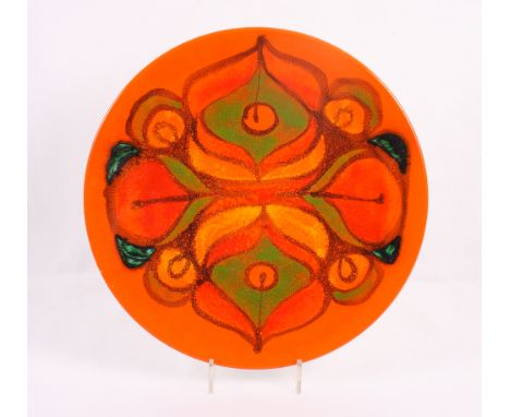 A Poole Pottery Delphis charger, 13 1/2" dia