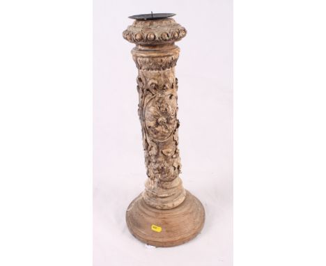 A pricket candlestick with cream floral moulded column on turned pine base, 21" high