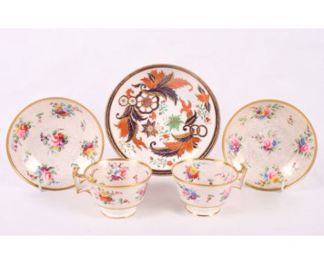 Two early 19th Century Spode tea cups and saucers, pattern 2009, and a Spode saucer dish with Imari style decoration