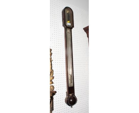 A 19th Century stick barometer with silvered register plate and thermometer