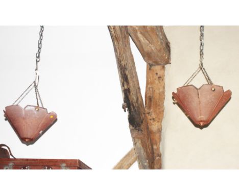 A pair of Art Deco hexagonal pink glass pendant light fittings decorated floral panels