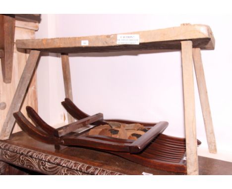 A 19th Century wooden pig bench, 40" x 14"