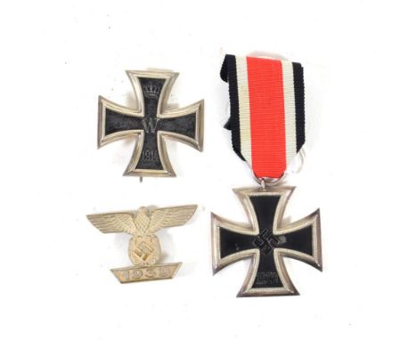 A German Third Reich Iron Cross, second class, the suspender ring stamped 65 for Klein &amp; Quenzer AG; a First World War Ge