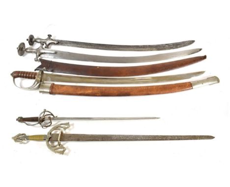 A 19th Century Indian Talwar, with 77cm single edge triple fullered curved steel blade, steel cruciform hilt with disc pommel