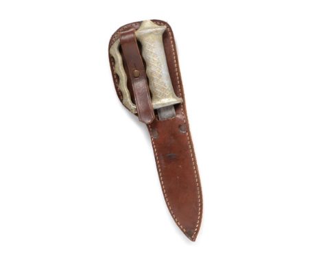 A Second World War Australian and New Zealand Commando Knuckle Knife, with 15.5cm double edge spearpoint steel blade, alumini