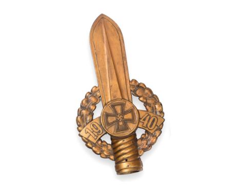 A German Third Reich NSKOV Gilded Bakelite Flag Pole Finial, modelled as a Gladius type sword with wrythen fluted socket 'gri