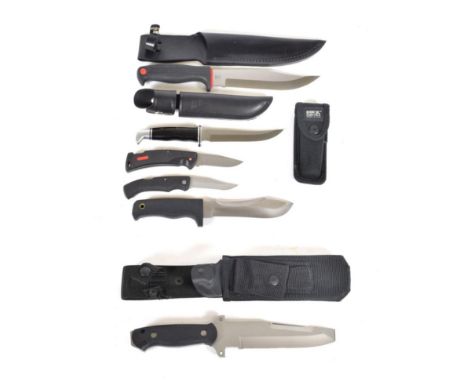 A Collection of Seven Various Modern Hunting Knives, a boxed Buck Intrepid Chisel Point, a Buck 121C in leather sheath, a Pum