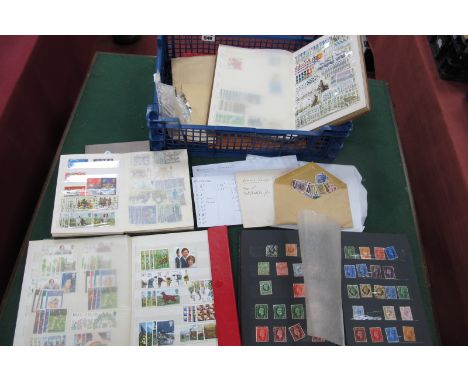 An Accumulation of G.B and World Stamps, early to modern, in four stockbooks, loose leaf album, junior album and on and off p