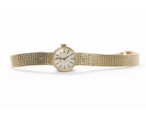 LADY'S ZENITH WRISTWATCHSigned manual wind movement, the silvered dial with gilt baton hour markers, blued steel hands, the 1