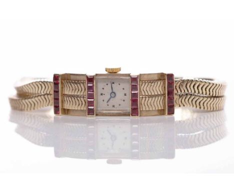 EARLY TWENTIETH CENTURY LADY'S NINE CARAT GOLD RUBY COCKTAIL WATCHunsigned seventeen jewels manual wind movement, the square 