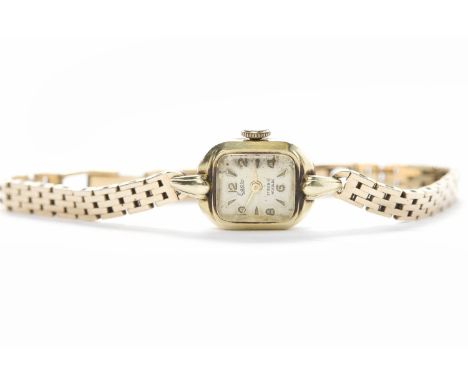 LADY'S ESCO WRISTWATCHseventeen jewels manual wind movement, the silvered dial with applied gilt Arabic numeral and baton hou