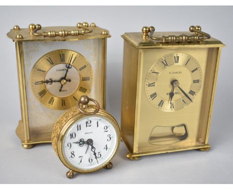 Two Brass Cased Carriage Clocks with Battery Movements together with a Circular Alarm Clock 