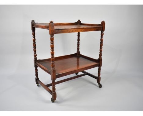 A Mid 20th Century Oak Two Tier Galleried Trolley with Bobbin Supports, 61cms Wide 