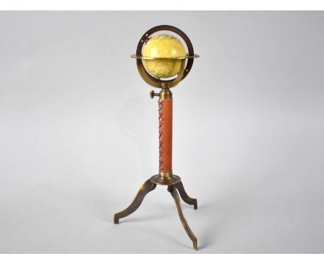 A Small Reproduction Novelty Desktop Rise and Fall Globe as was Made in Paris by Gobille at Royal Palace, 27cms High 