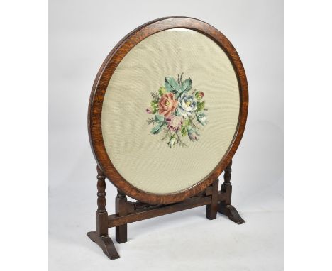 An Edwardian Circular Oak Swivel Table or Screen, Tapestry Centre, 68cms Diameter 