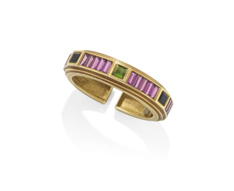 KIESELSTEIN-CORD: TOURMALINE BANGLE, 1988The ridged cuff inset with three square-cut green tourmalines between rows of channe