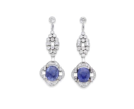 PAIR OF MID 20TH CENTURY SAPPHIRE AND DIAMOND PENDENT EARRINGSEach set with a mixed-cut sapphire, weighing either 12.33 carat