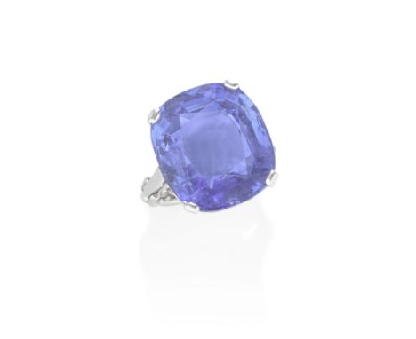 MID 20TH CENTURY SAPPHIRE RINGThe cushion-shaped sapphire, on a band of expandable-linking, ring size J - MFootnotes:Accompan