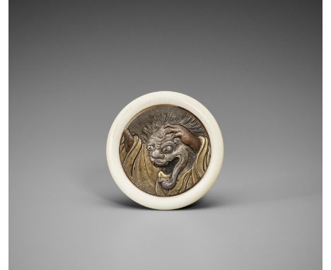 A RARE IVORY AND METAL KAGAMIBUTA NETSUKE WITH BAKEMONOJapan, late 19th centuryThe metal plate set into a flattened ivory bow