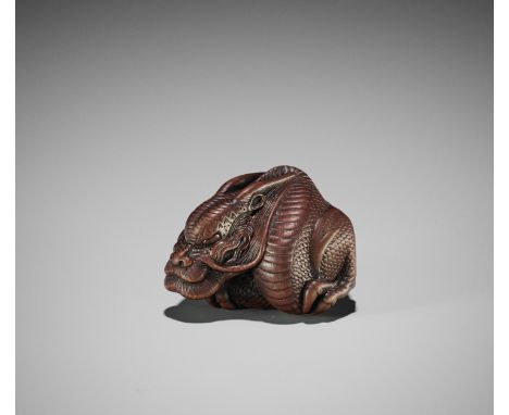 VADYM PYVOVAR: A WOOD NETSUKE OF A NAGOYA STYLE DRAGONBy Vadym Pyvovar, signed with the artist's markUkraine, 2021Finely carv