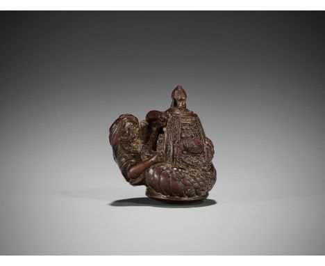 MINKO: A WOOD NETSUKE OF KIYOHIME ON THE BELL OF DOJOJIBy Tanaka Juntoku Minko (1735-1816), signed Minko with kakihanJapan, T
