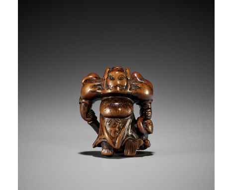 AN UNUSUAL WOOD NETSUKE OF SHOKI AND ONIJapan, possibly Osaka, 18th century, Edo period (1615-1868)An unusually expressive wo