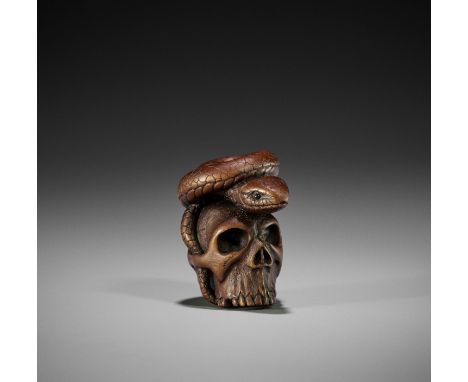 ALEXANDER DERKACHENKO: A WOOD NETSUKE OF A SNAKE AND SKULLBy Alexander Derkachenko, signed with the artist's markUkraine, 202