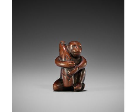 AN EARLY EDO SCHOOL WOOD NETSUKE OF A MONKEY WITH BAMBOO SHOOTJapan, Edo (Tokyo), c. 1780, Edo period (1615-1868)Finely carve