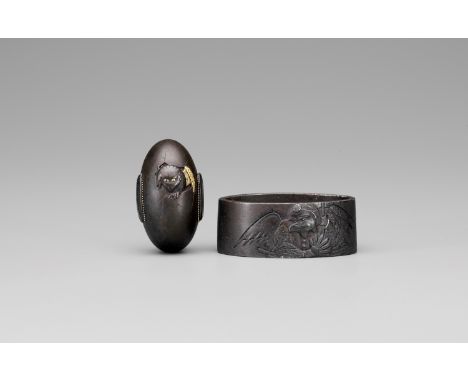 A FUCHI AND KASHIRA WITH TENGUJapan, 18th/19th century, Edo period (1615-1868)Both of shibuichi, the kashira with a rounded t