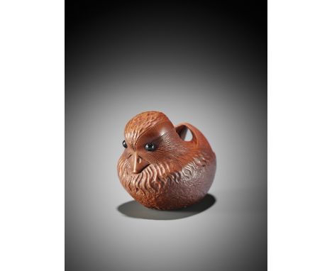 GEORGES WEIL: AN AMUSING WOOD NETSUKE OF A DUCKBy Georges Weil (b. 1938), signed with the artist's markCarved from red-staine