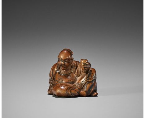 ANGANSAI: A WOOD NETSUKE OF RIHAKU (LI BAI)By Angansai, signed AngansaiJapan, Edo (Tokyo), mid-19th century, Edo period (1615