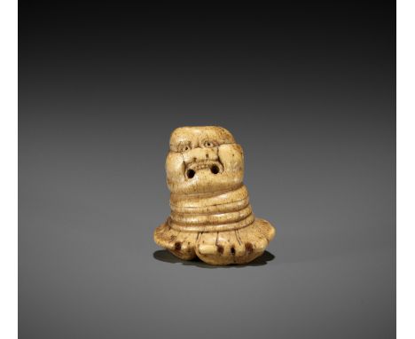 A RARE STAG ANTLER 'SILK SEAL' TYPE NETSUKE OF A FOREIGNER  Japan, late 17th - early 18th century, Edo period (1615-1868)Carv