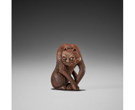 VADYM PYVOVAR: A WOOD NETSUKE OF TIGERBy Vadym Pyvovar, signed with the artist's markUkraine, 2021Charmingly carved as a tige