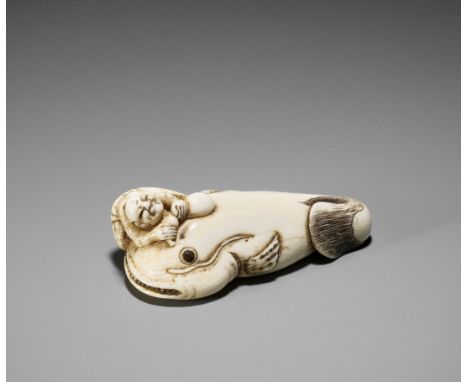 AN IVORY NETSUKE OF KADORI MYOJIN WITH NAMAZUJapan, early 19th century, Edo period (1615-1868)Carved as Kadori Myojin sitting