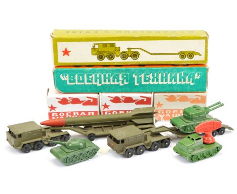 Russian made a group of 5 military smaller scale issues - to include tank transporter, rocket transporter, radar truck plus o