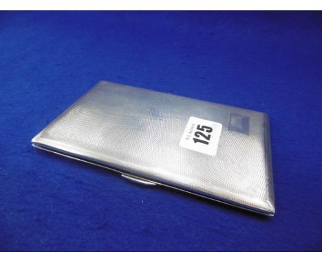 AN ART DECO ENGINE TURNED HM SILVER CIGARETTE CASE