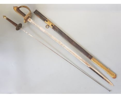 English navel dress sword in scabbard by Manton London together with a solingen fencing foil.