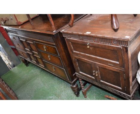 An early 20th century oak music room side cabinet, substantial gallery back above a moulded rectangular top comprising three 