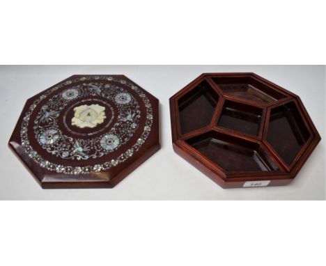 A Chinese lacquer and mother of pearl octagonal box, lift-off cover applied with chrysanthemums, phoenix and leafy scrolls, e