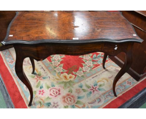 A 19th century walnut card table, hinged shaped rectangular top enclosing a baize lined playing surface, tapered serpentine l