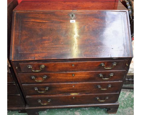 A George III mahogany bureau, fall front enclosing a small door, drawers and pigeon holes above four long graduated drawers, 