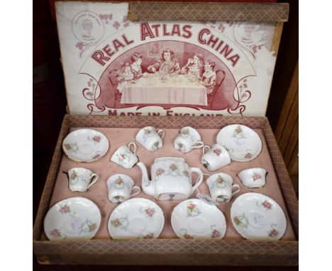 A Real Atlas China child's six setting tea service, c.1910, original fitted box 