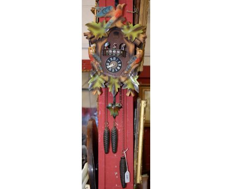 A West German cuckoo clock, 45cm high to pendulum