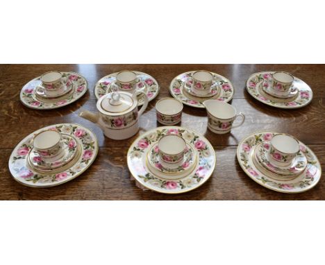 A Royal Worcester Royal Garden pattern tea service, for six, pink and white roses on white ground, comprising cups, saucers, 