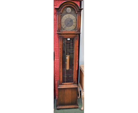 A 20th century oak cased longcase clock, arched dial inscribed Tempus Fugit, 188cm high
